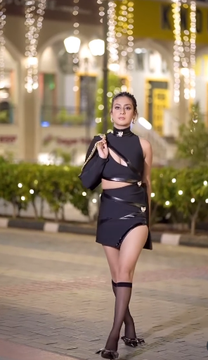 Tejassvi Prakash and Isha Malvia inspired Fierce Curve Black Asymmetric Cut-Out Mini Dress